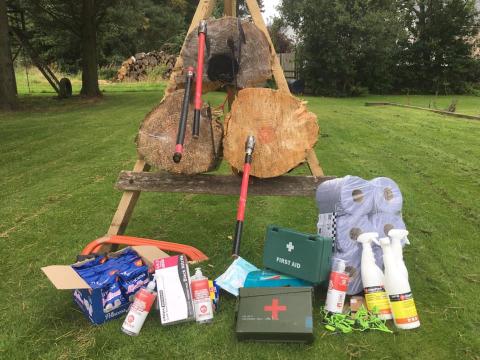 Ready for anything: marshmallows, sanitiser, tomahawks and first aid kit.